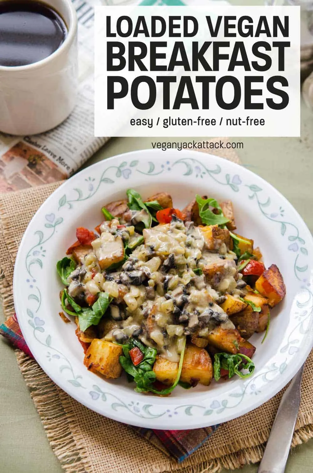 Bowl of Loaded Breakfast Potatoes with fork on burlap material