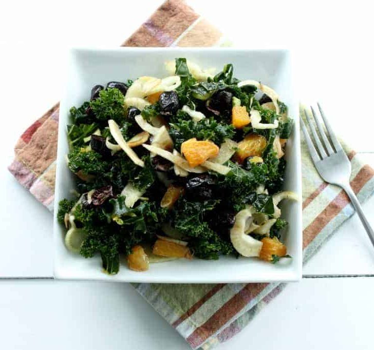 This Winter Kale Salad, is simple, poppin' with flavor and easy to prepare. Perfect for getting a healthy start on your new year!