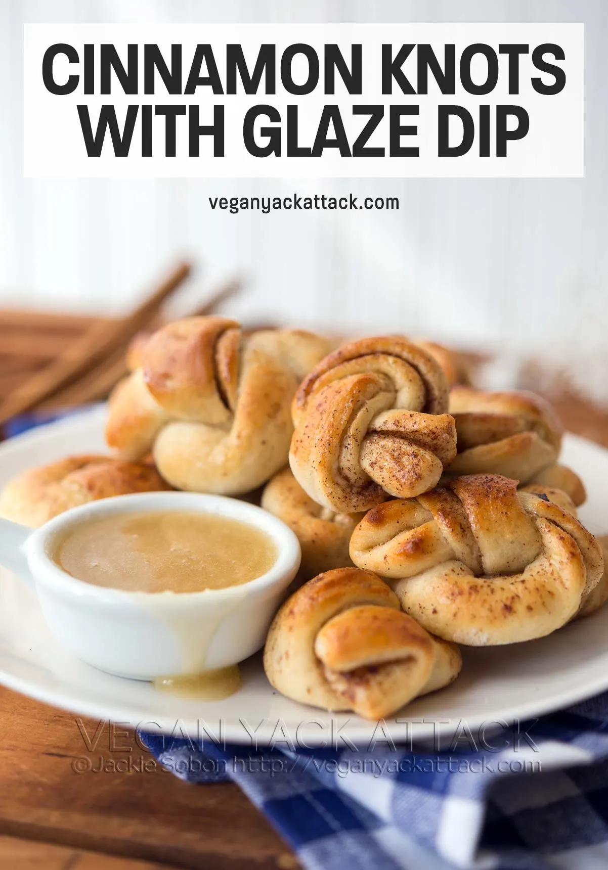 plate of cinnamon dough pastries with glaze dip