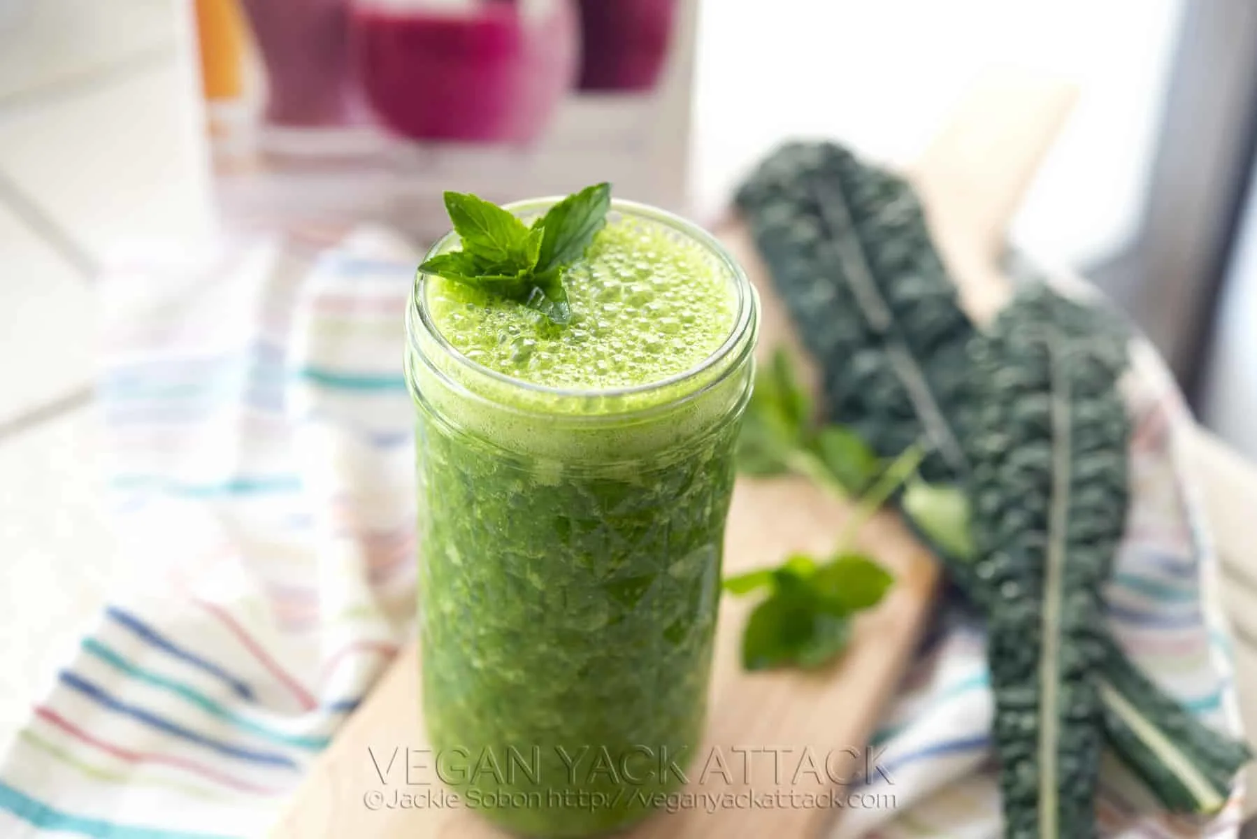 Image of Green Mojito Smoothie in a small mason jar, with mint garnish