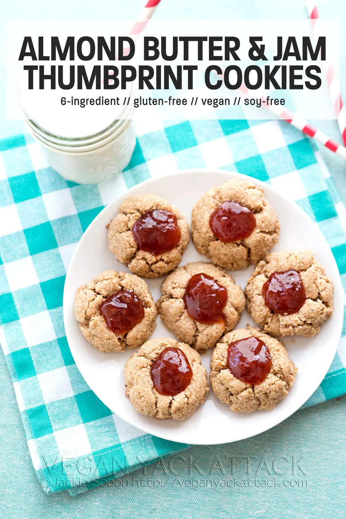 Vegan Gluten Free Almond Butter Jam Thumbprint Cookies on a white plate, sitting on a teal gingham napkin