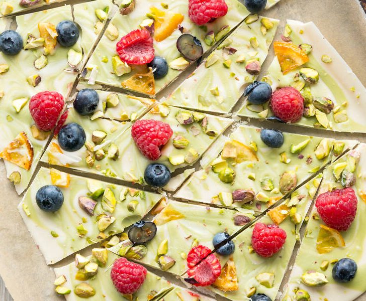 Spring Vegan White Chocolate Matcha Bark on a parchment-lined baking sheet