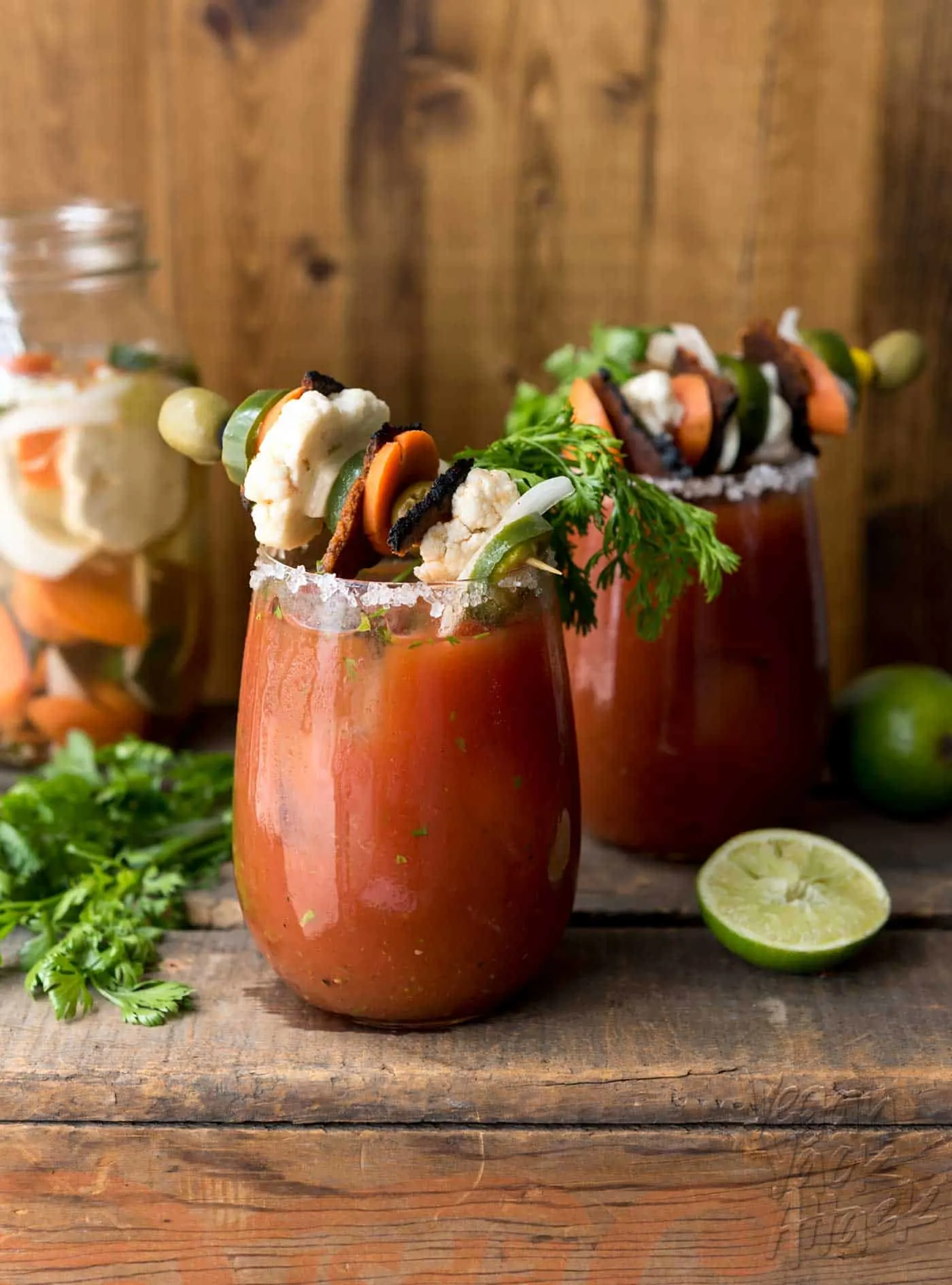 Loaded Chipotle Bloody Mary! Full of flavor from fresh cilantro, lime, homemade escabeche and #vegan bacon. #fathersday #craftyourcocktail