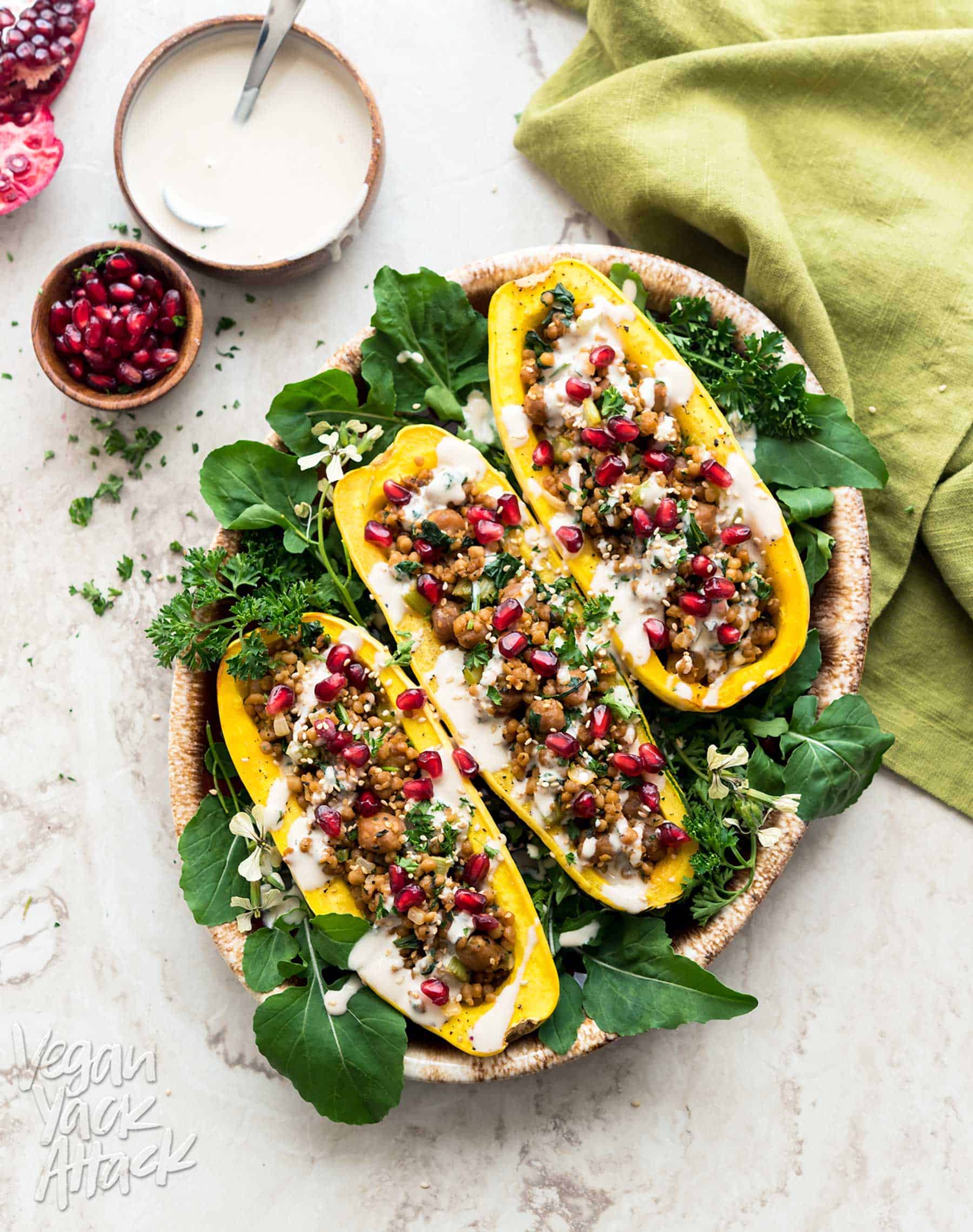 These Couscous-Stuffed Delicata Squash make for a beautiful and comforting dish, to adorn your holiday table, this year! Made with Wild Garden Pilaf. #vegan #soyfree #nutfree
