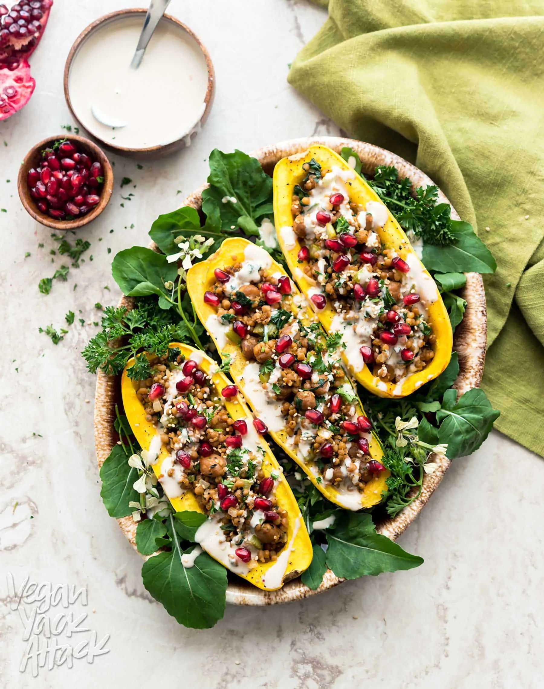 These Couscous-Stuffed Delicata Squash make for a beautiful and comforting dish, to adorn your holiday table, this year! Made with Wild Garden Pilaf. #vegan #soyfree #nutfree #WildGardenEats