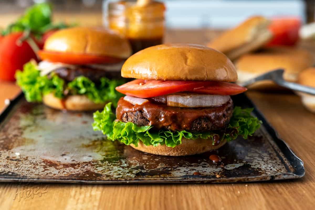 We're still in the heart of grilling season, and what better way to whet that appetite than with a Down Home BBQ Burger from the Vegan Burgers and Burritos Cookbook, by Sophia DeSantis? #vegan #bbq #burgers #vdbburgersandburritoscookbook