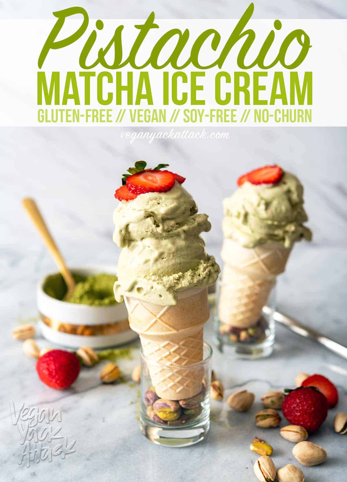 Image of two cones of pistachio matcha ice cream on a marble counter top