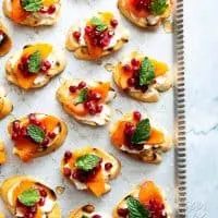 These Pomegranate Persimmon Crostini are as delicious as they are gorgeous. Plus, VERY easy-to-make! #vegan #soyfree #appetizer #veganyackattack
