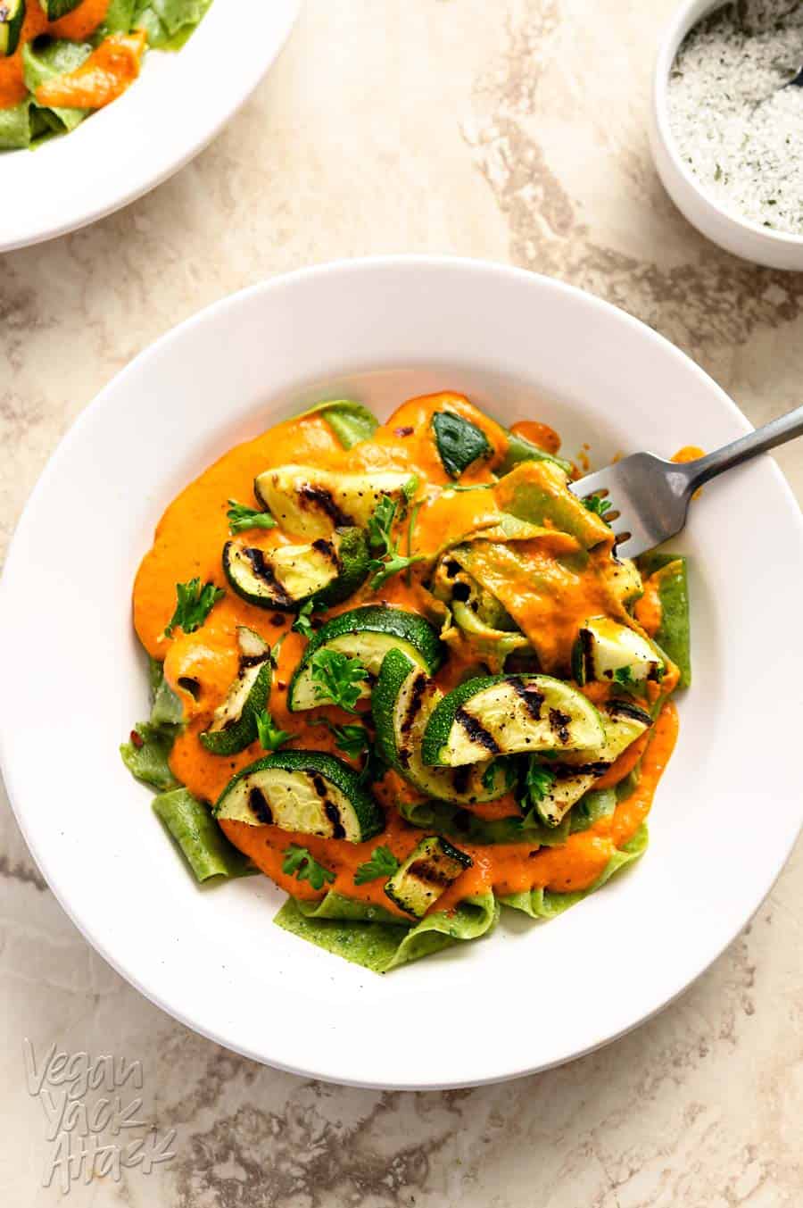 This recipe for homemade Spinach Pappardelle with Roasted Red Pepper Sauce is intensely flavorful and pretty easy to make! Plus, it’s dairy-free and egg-free. #vegan #plantbased #pappardelle #redpeppers