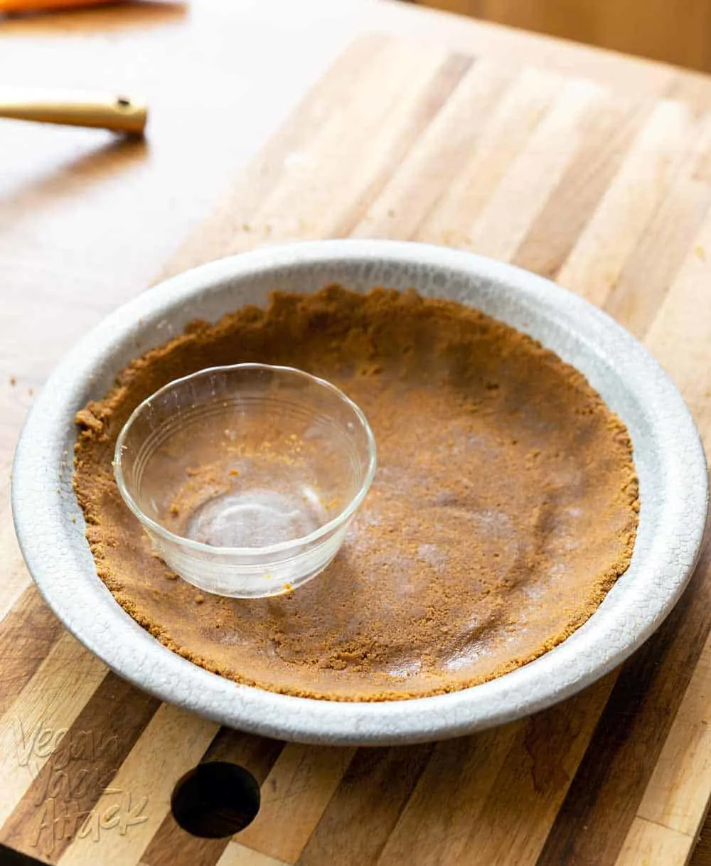 Gluten-free graham cracker pie crust in a metal pie pan