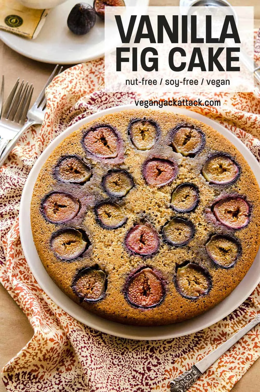upside down fig cake on white plate with patterned linen