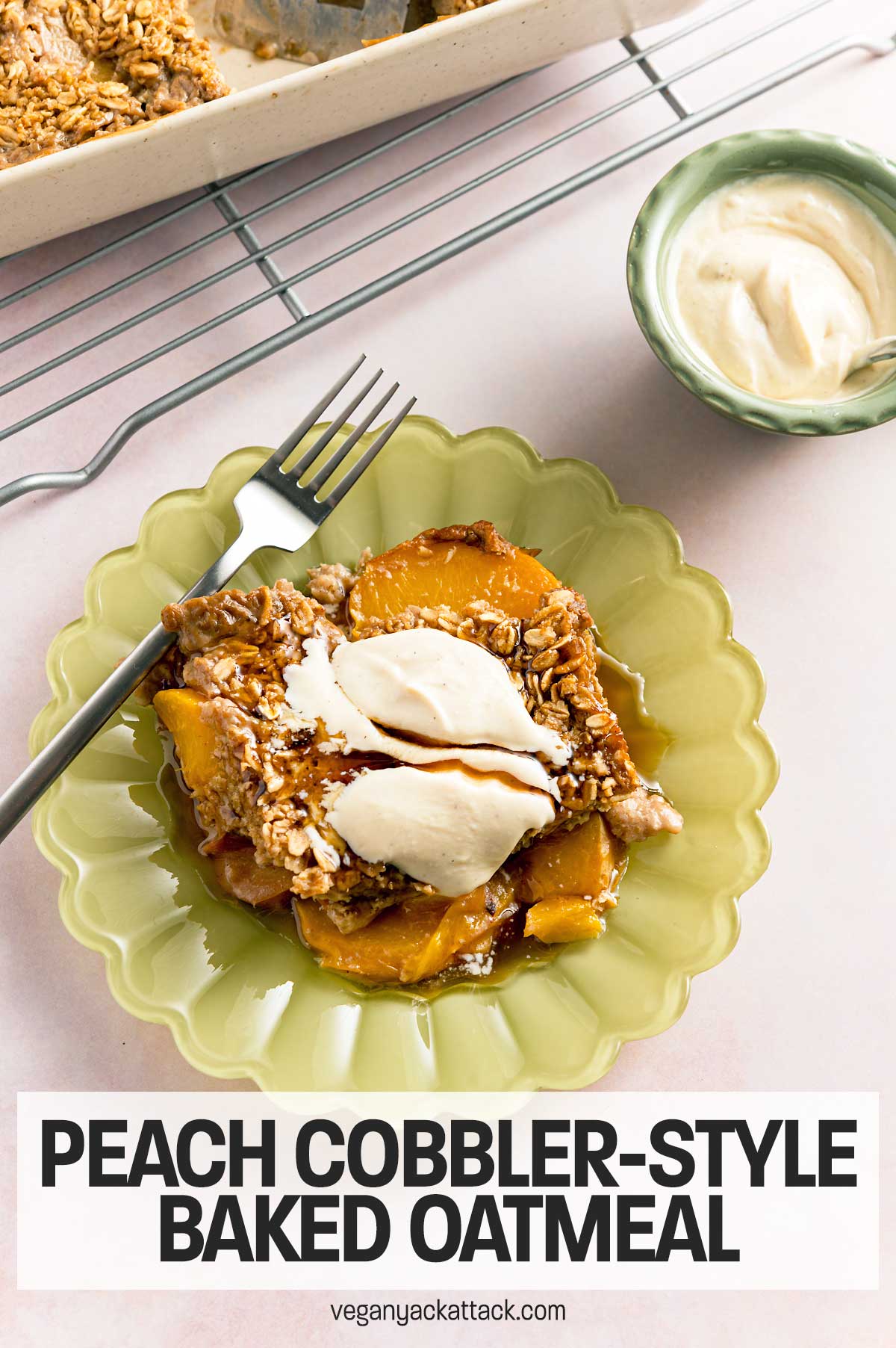 piece of peach cobbler baked oatmeal on a green plate with a small bowl of yogurt